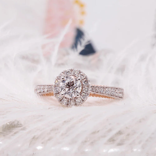 Two-tone gold ring with round-cut diamond