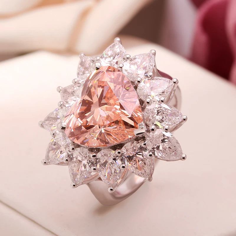 Gold ring featuring a pink heart-shaped diamond