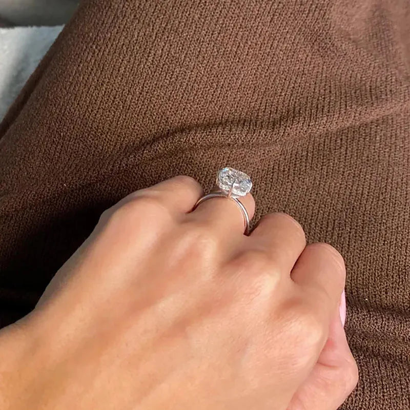 Radiant diamond ring with accent stones