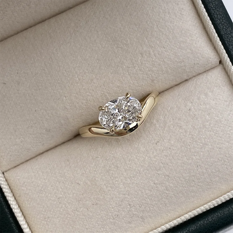 Oval-cut lab diamond in solitaire ring