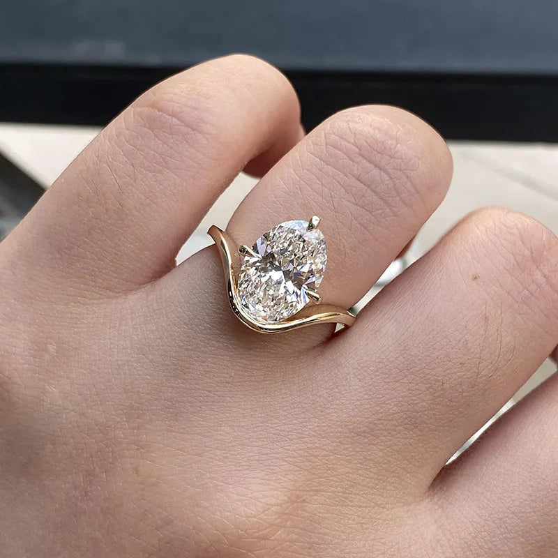 Oval-cut lab-grown diamond twist-shank ring