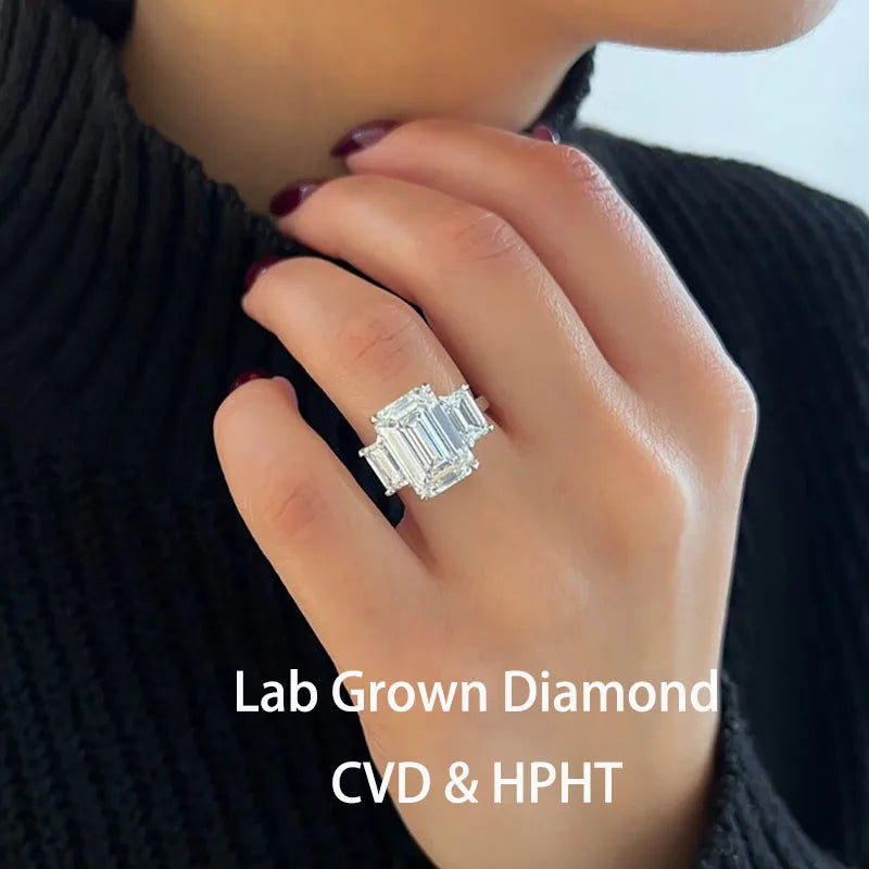 Emerald-cut lab-grown diamond three-stone engagement ring