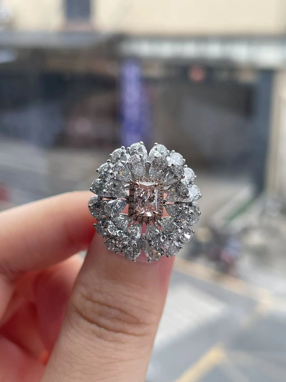 Radiant-cut pink diamond and pear-cut diamond ring