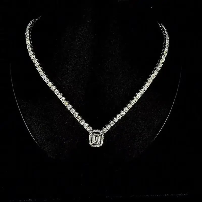 Necklace with emerald-cut and round diamonds