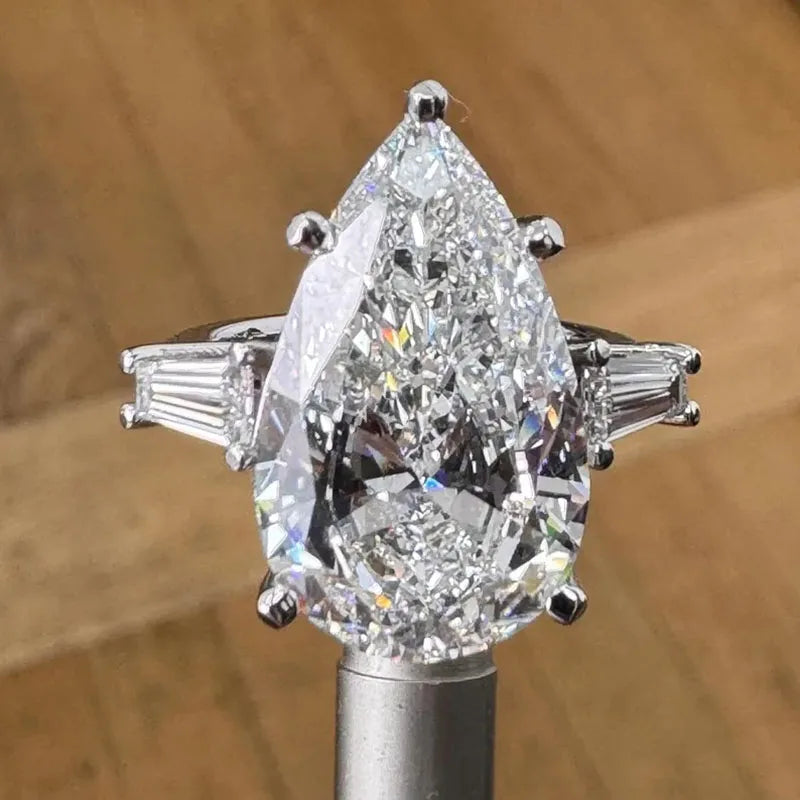 Pear diamond engagement ring with baguette side stones