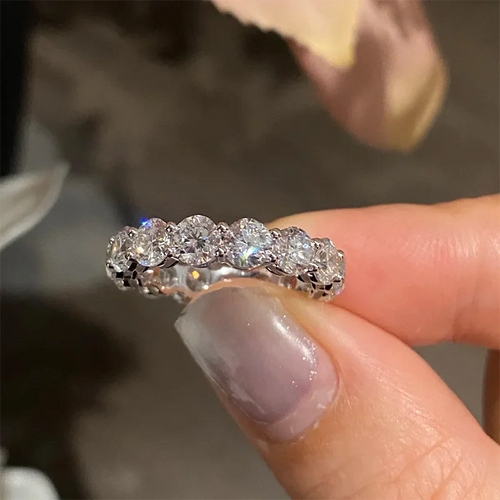 Sterling silver ring set with round diamonds