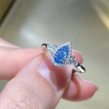 Blue pear lab-grown diamond three-stone ring