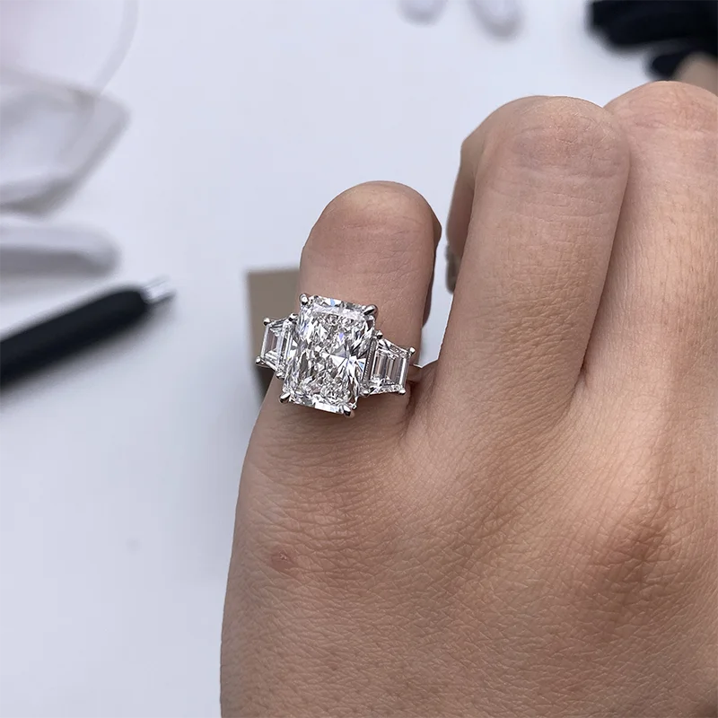 Radiant-cut lab-grown diamond three-stone engagement ring