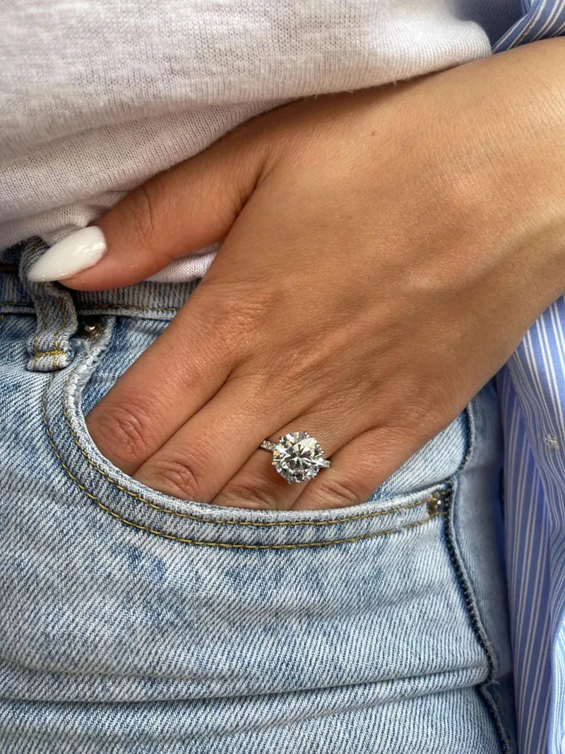 Round brilliant lab-grown diamond ring with side accents