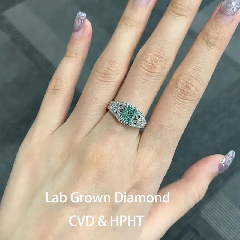 Green radiant-cut lab-grown diamond ring with accents