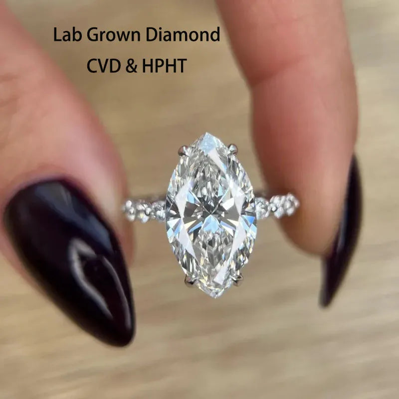 Marquise-cut lab-grown diamond ring with round diamond accents