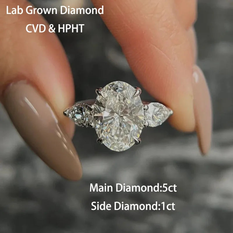Oval and pear lab-grown diamond three-stone ring