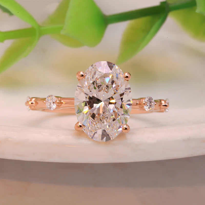 Lab-grown diamond ring with oval center and accent stones