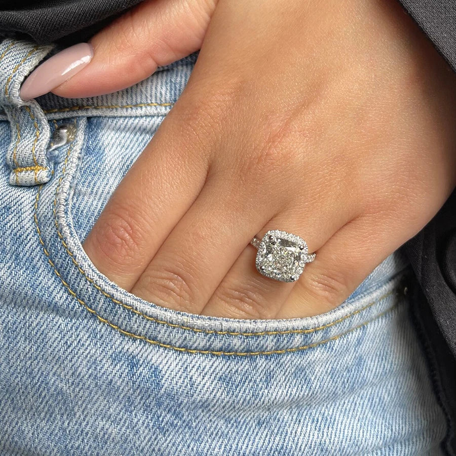Lab-grown cushion diamond ring with accent diamonds