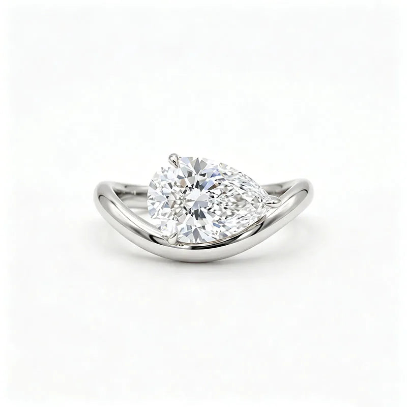 Pear-cut lab-grown diamond engagement ring with twisted shank