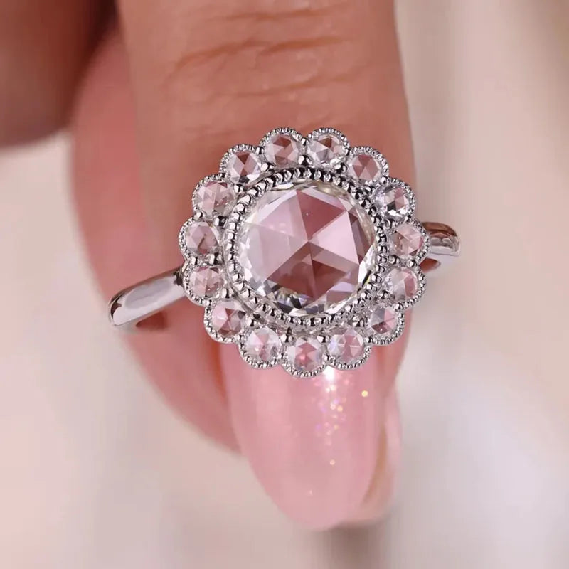 Gold sunflower diamond ring featuring round lab-grown diamonds