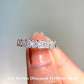 Radiant-cut lab-grown diamond half-eternity ring