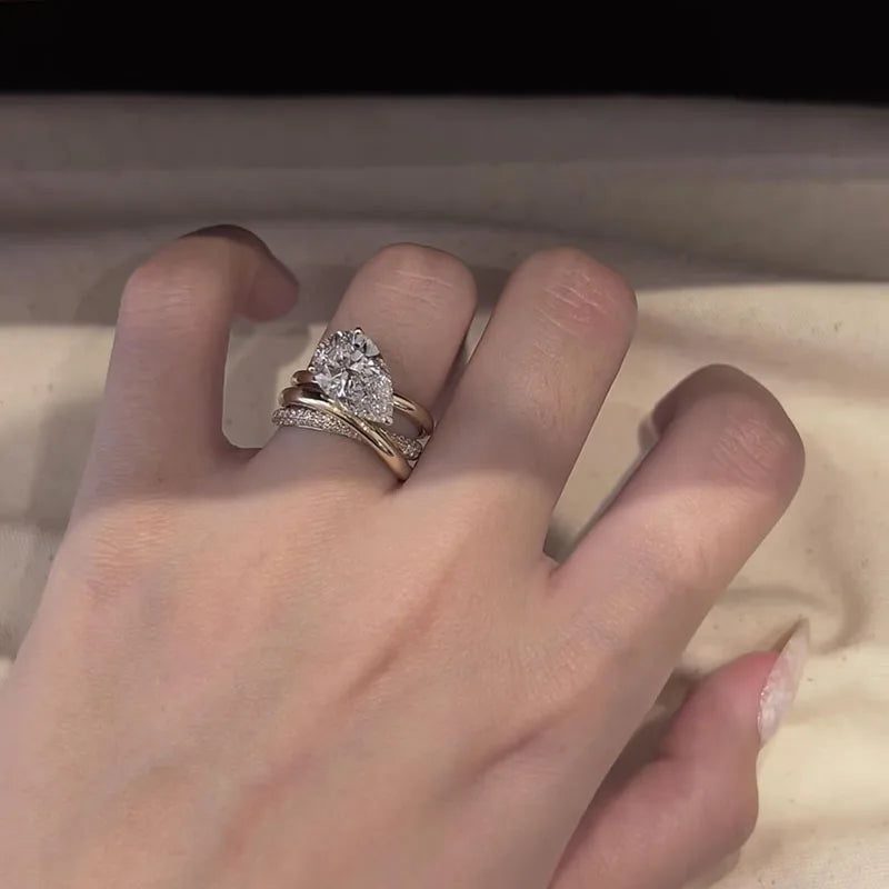 Pear-cut lab-grown diamond crossover ring