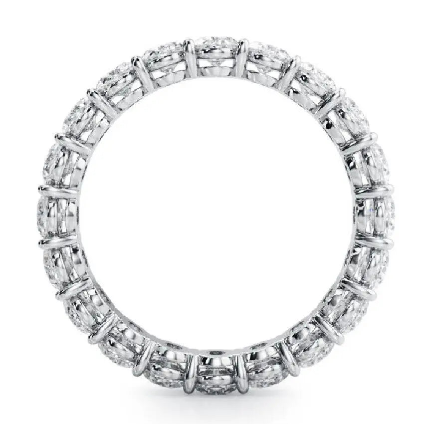 Prong-set oval diamond band ring