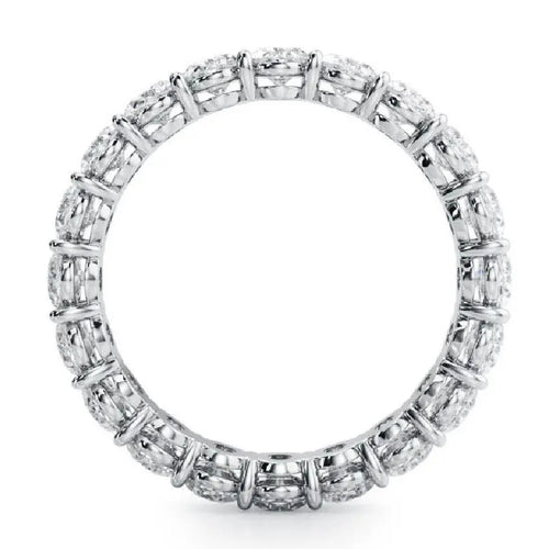 Prong-set oval diamond band ring