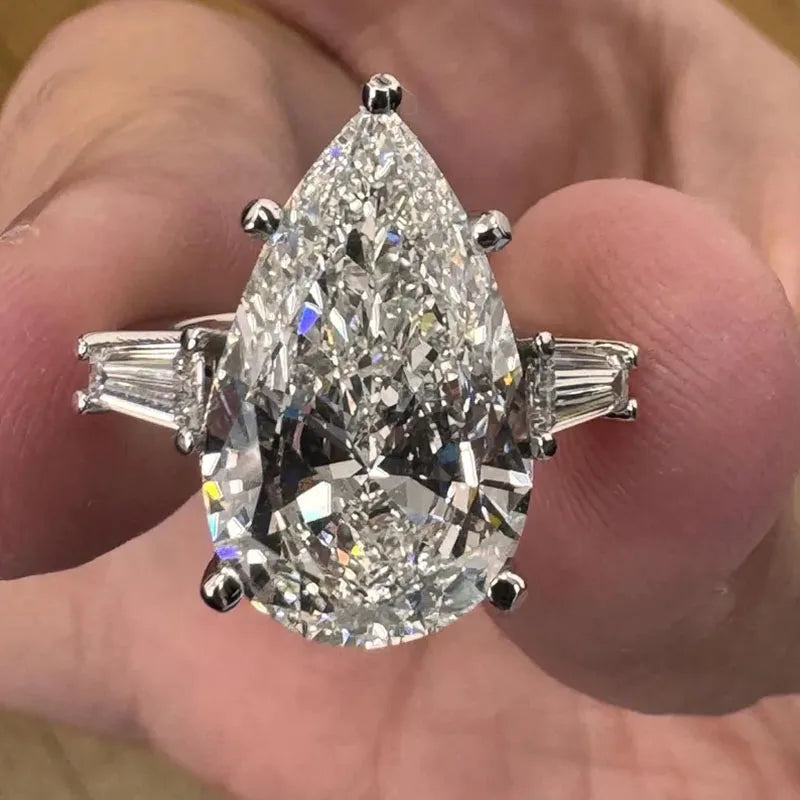 Gold pear-cut lab-grown diamond ring with side stones