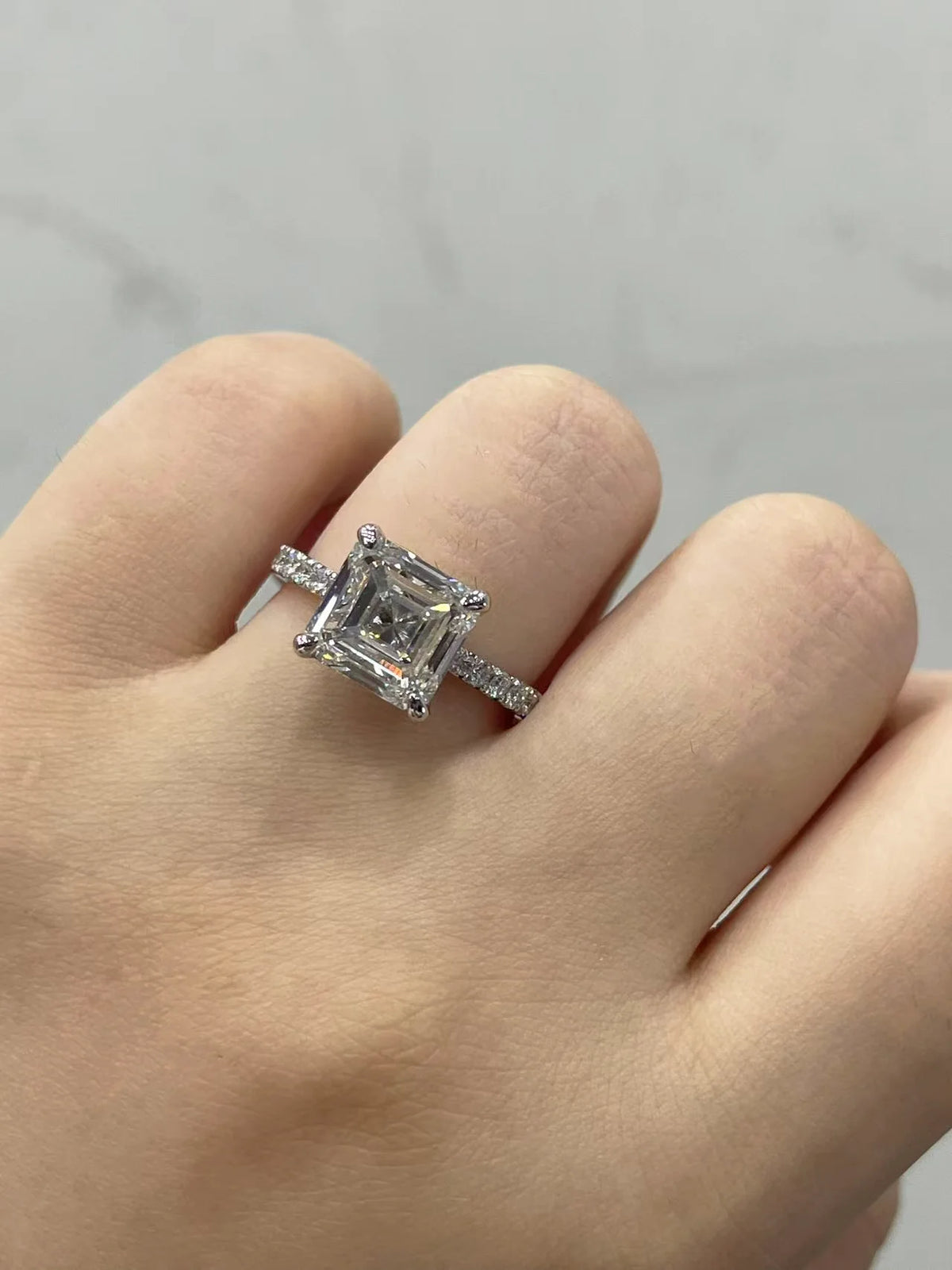 Lab-grown diamond accent ring with prong-set center stone