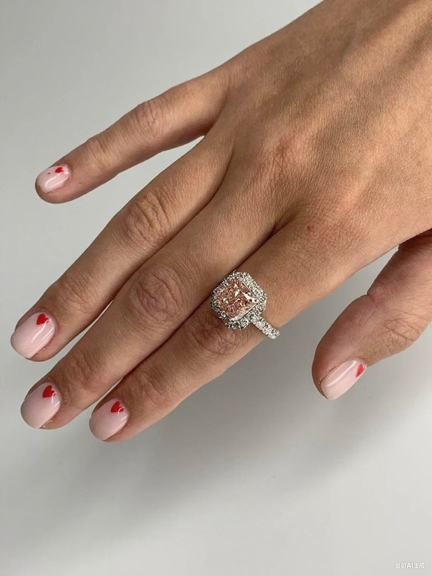 Pink elongated cushion diamond engagement ring