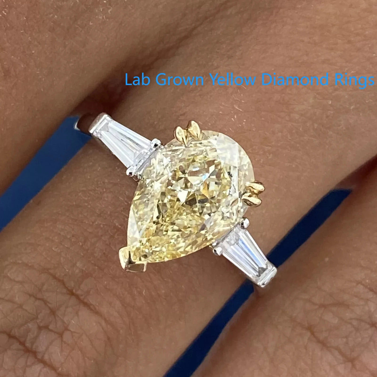 Yellow pear lab-grown diamond three-stone ring