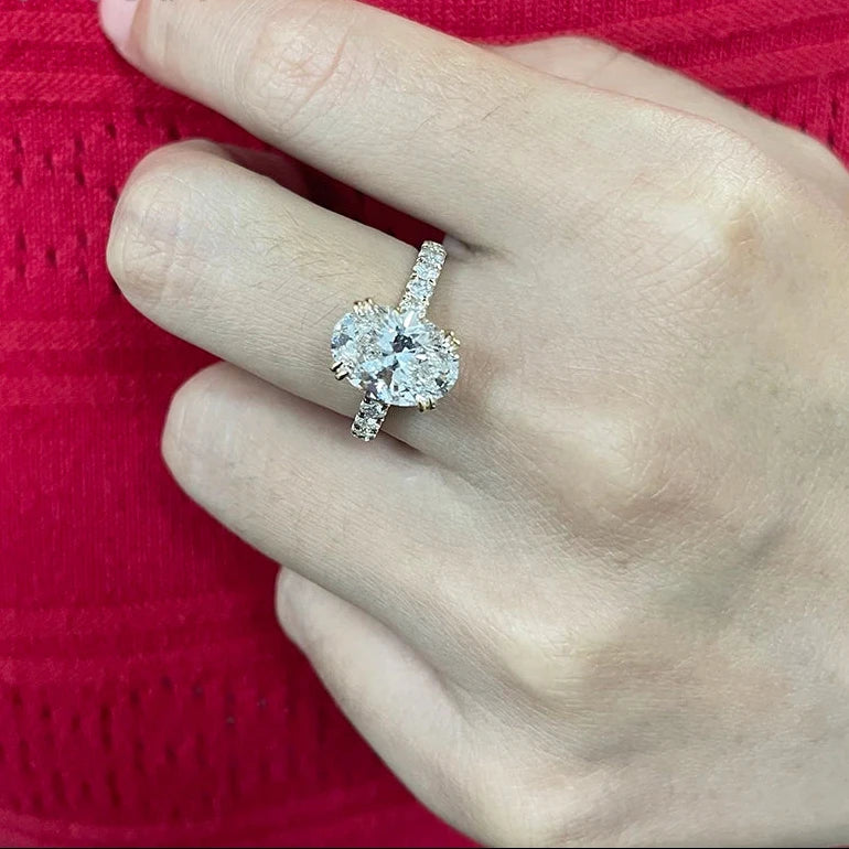 Oval lab-grown diamond halo engagement ring