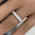 Emerald and round lab-grown diamond ring