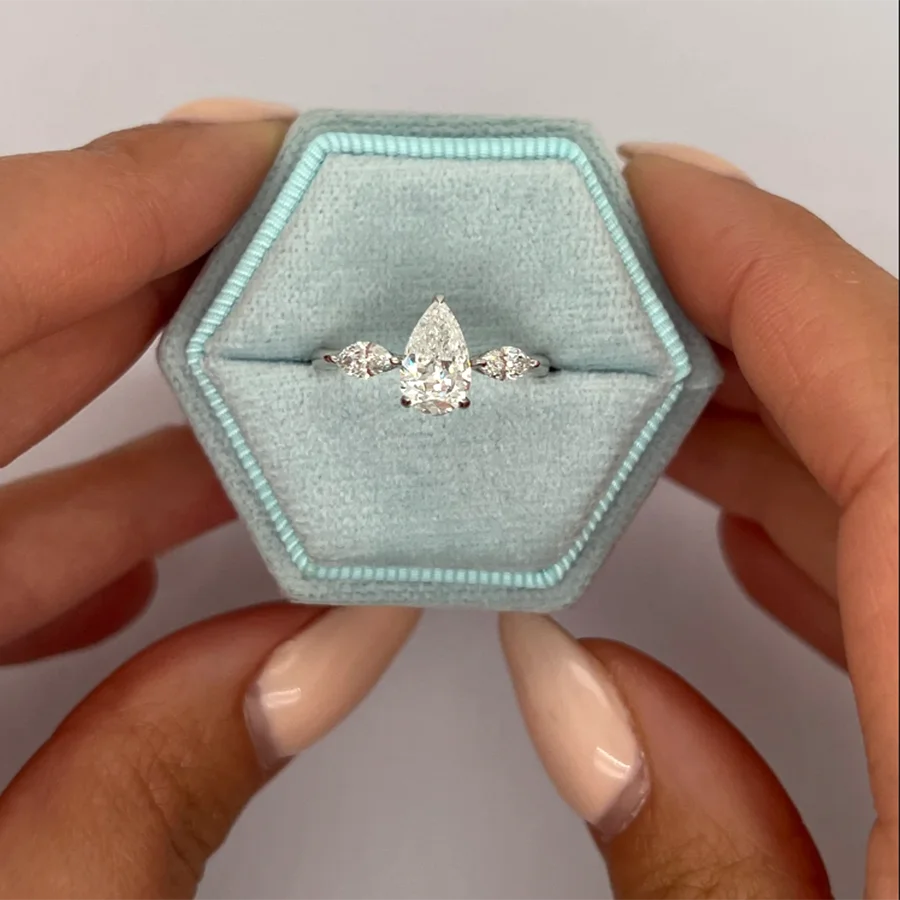 Diamond engagement ring with pavé accents