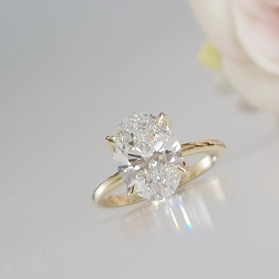 Oval lab-grown diamond ring with pavé band