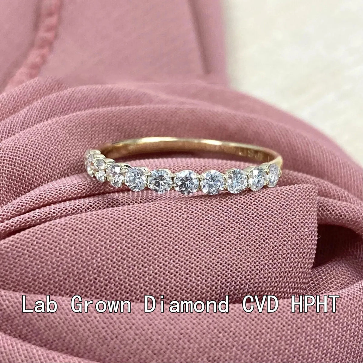 Round diamond band with refined setting