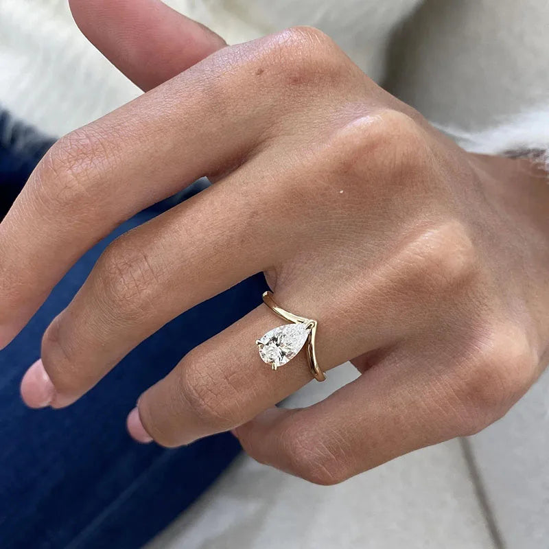 Chevron-style lab-grown pear diamond engagement ring