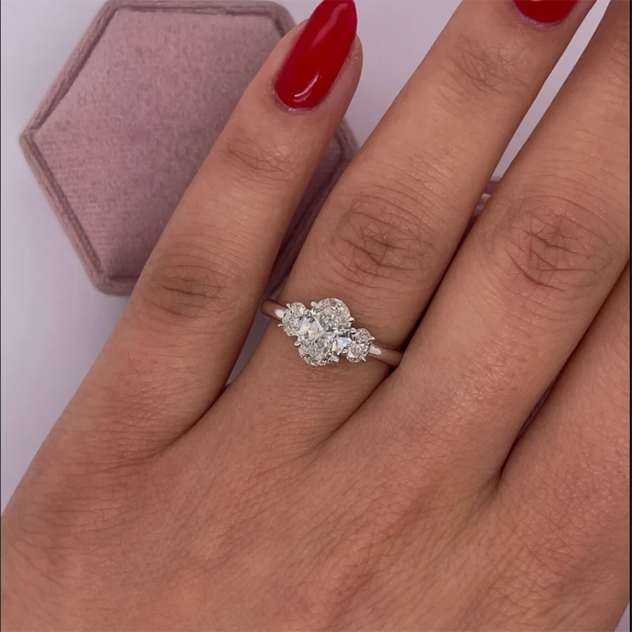 Three-stone lab-grown diamond ring with oval center