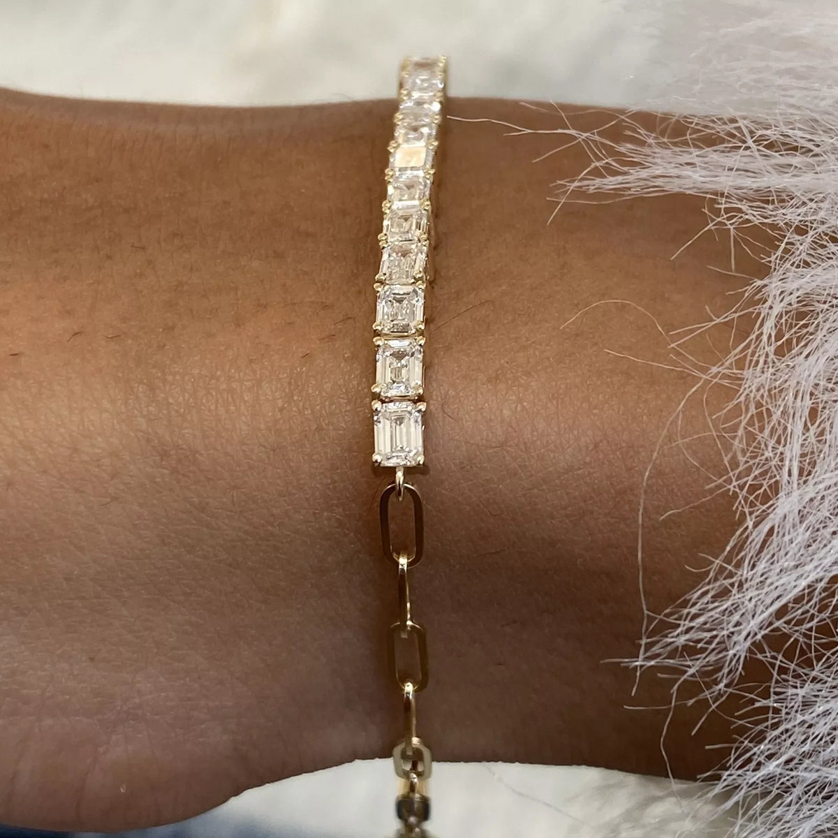 Emerald diamond bracelet with chain design