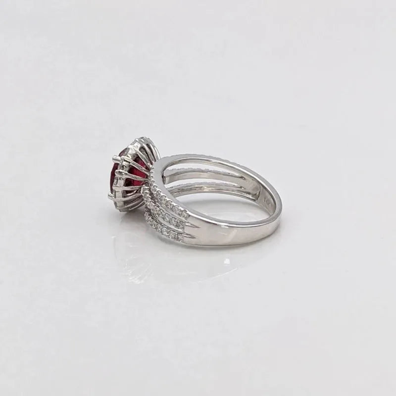 Round red lab-created ruby ring with accent stones