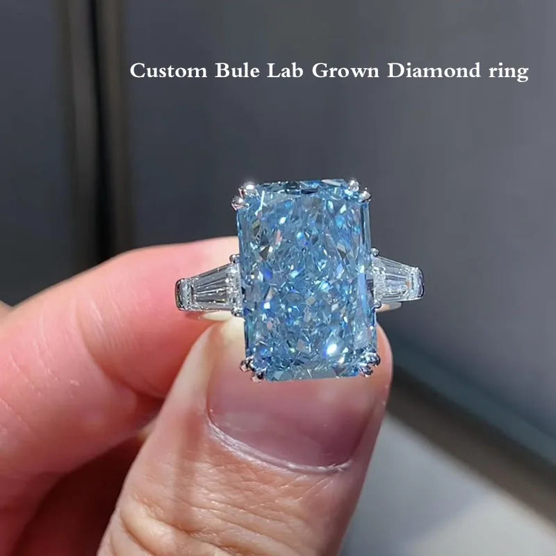 Radiant-cut blue diamond ring