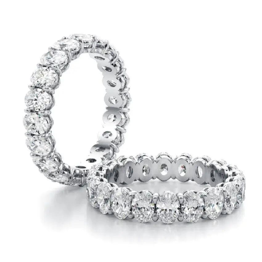 Row of oval lab-grown diamonds on wedding band
