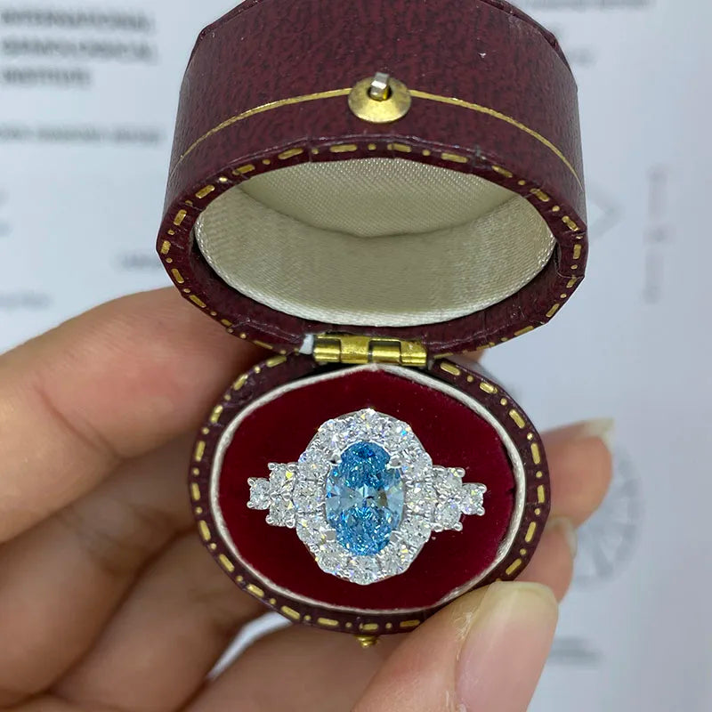 Blue oval-cut lab-grown diamond engagement ring