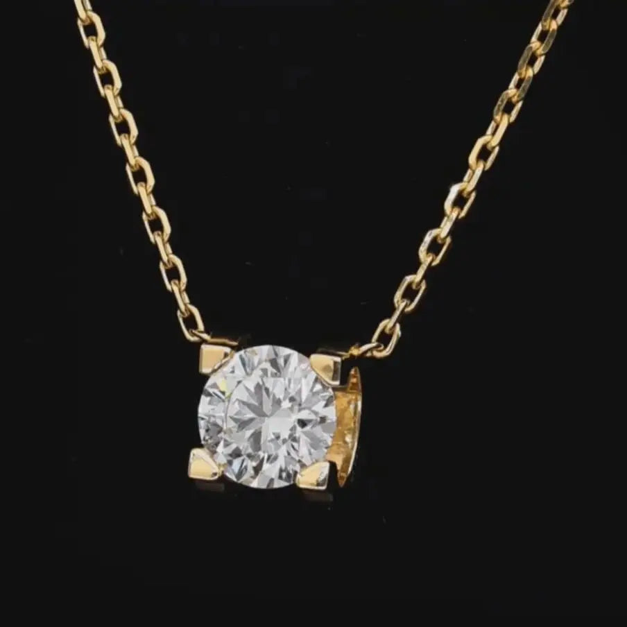 Round diamond pendant on fine chain
