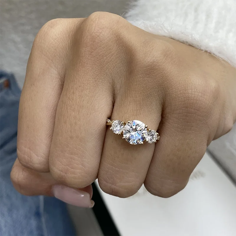 Three-stone round lab-grown diamond ring with twisted band