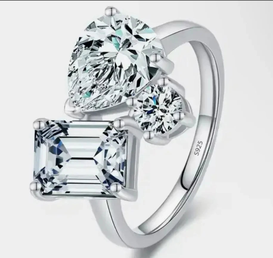 Emerald pear and round lab-grown diamond ring