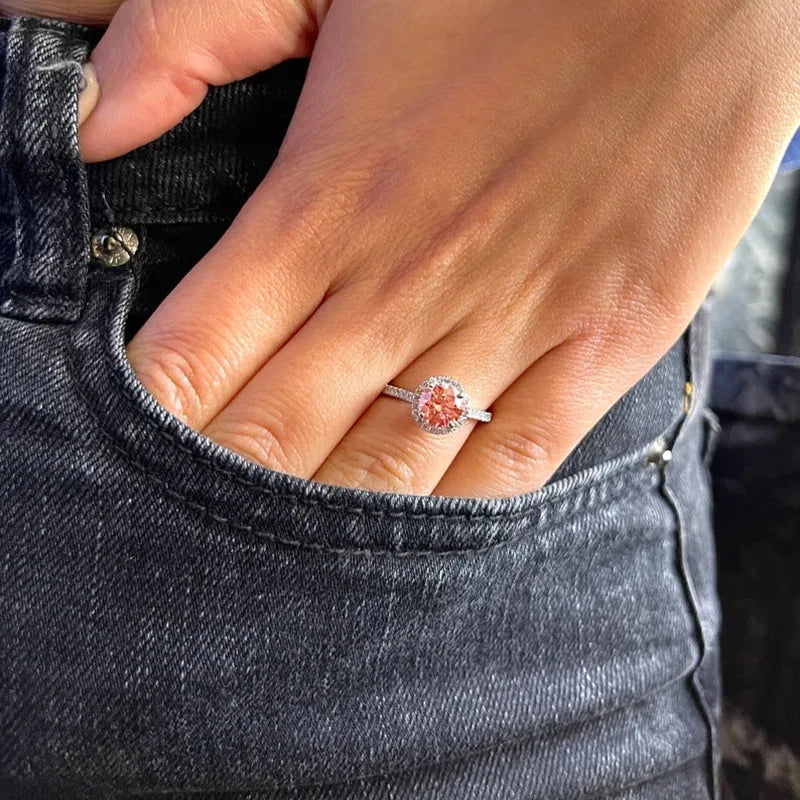 Gold ring with pink lab-grown diamond and side accents