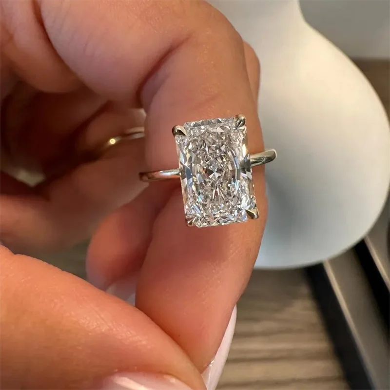 Radiant diamond ring with smaller diamond details
