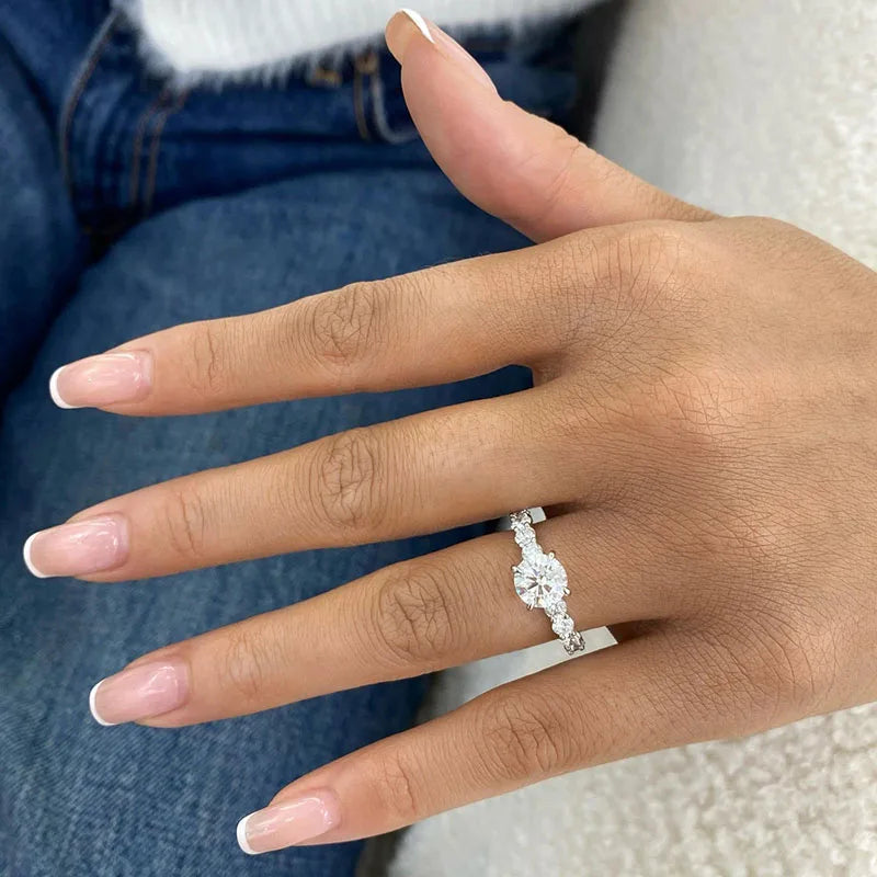 Lab-grown diamond ring with round center and diamond accents