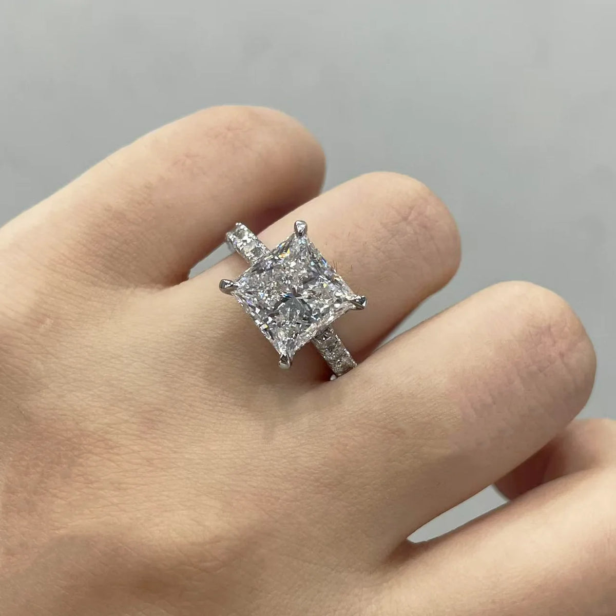 Lab-grown diamond ring with princess-cut center stone