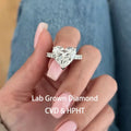 Heart-cut lab-grown diamond ring with accent stones
