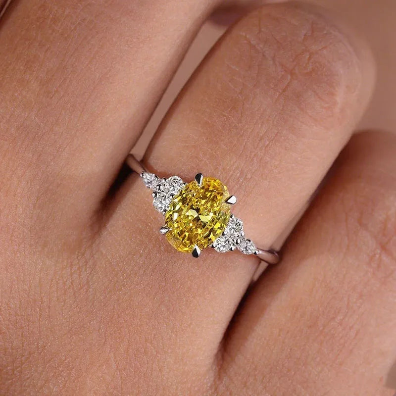 Yellow oval-cut diamond engagement ring