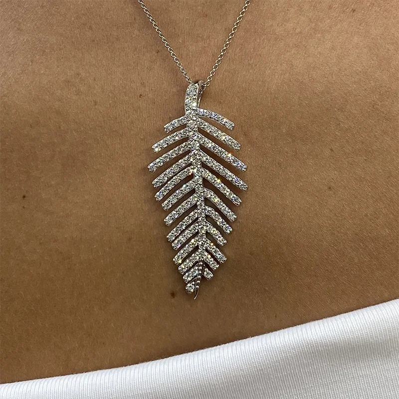 Leaf-inspired pendant set with round lab-grown diamonds
